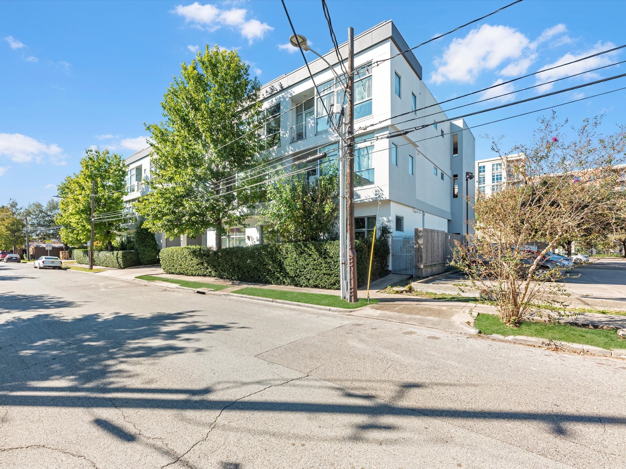 1406 Columbus Street, Unit 303 Houston, TX 77019 - Photo 15 of 17 a street sign on a side of street