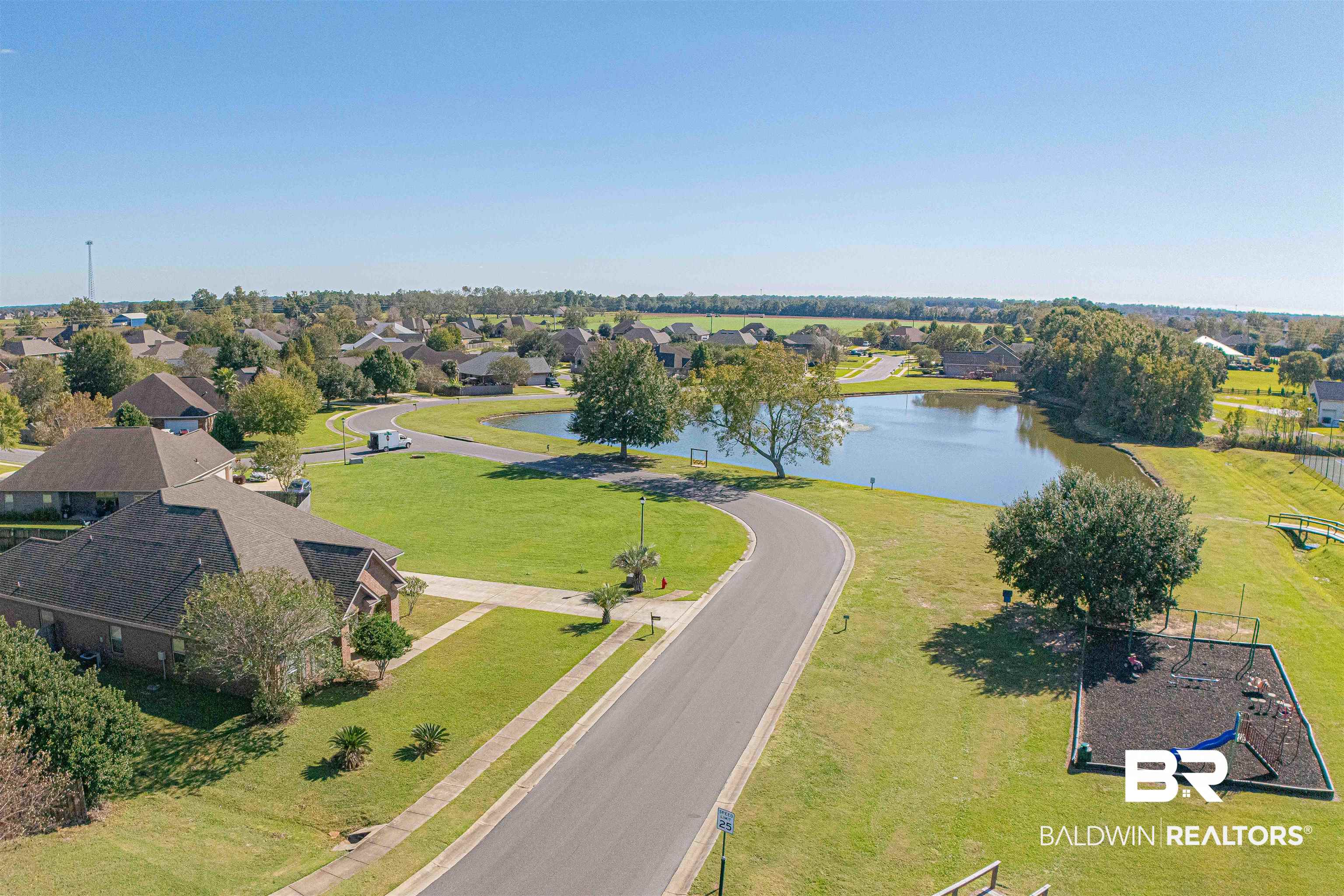 25234 Fairfax Road Daphne, AL 36526 - Photo 37 of 45 Aerial view of residential area with a large body of water