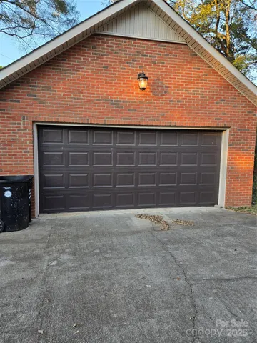 a stove top oven sitting inside of a kitchen