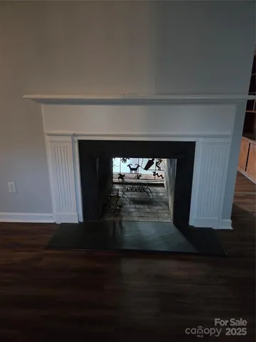 a living room with a fireplace