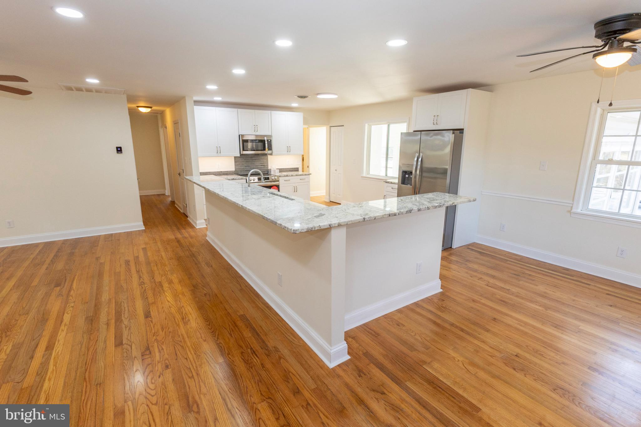 49151 Wynne Road Ridge, MD 20680 - Photo 13 of 80 Bright, open kitchen with elegant finishes.