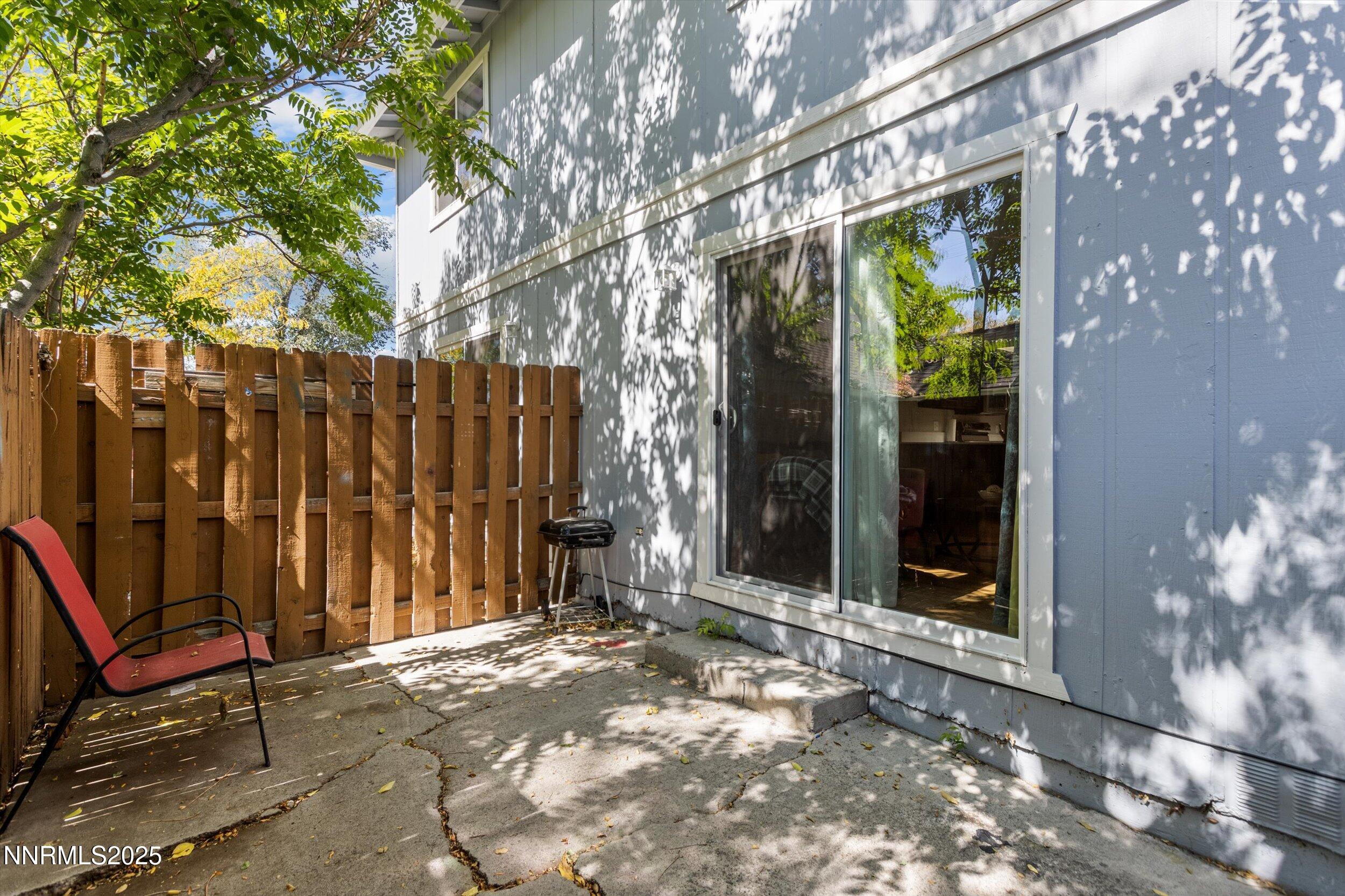 400 Claremont Street Reno, NV 89502 - Photo 21 of 32 a view of backyard with tub and wooden fence