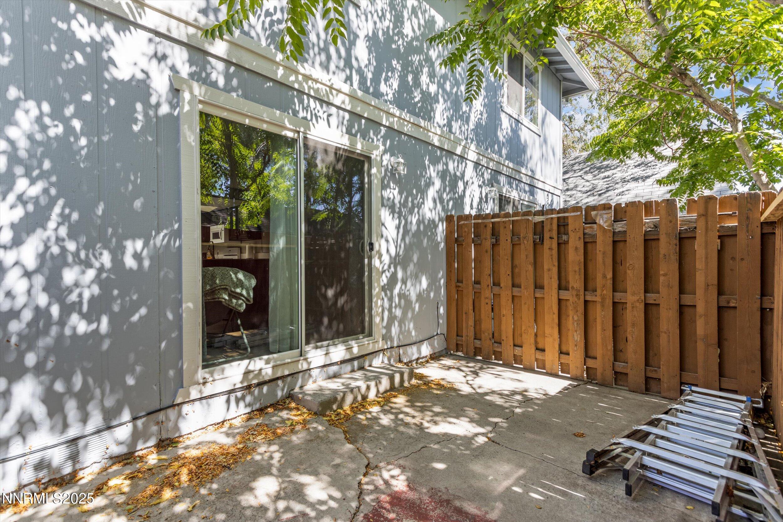 400 Claremont Street Reno, NV 89502 - Photo 22 of 32 a view of backyard with tub and wooden fence