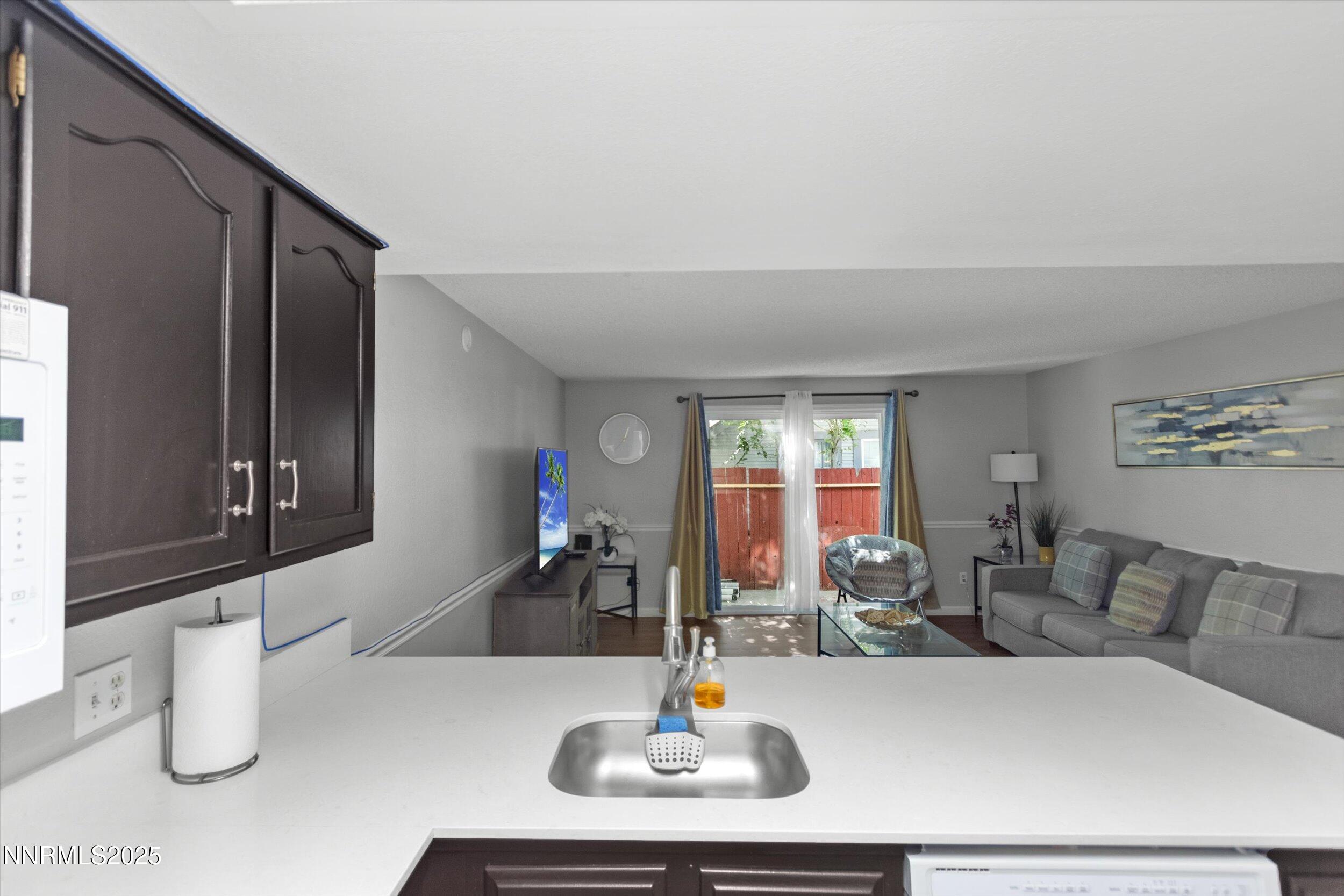 400 Claremont Street Reno, NV 89502 - Photo 27 of 32 a living room with furniture and a large window