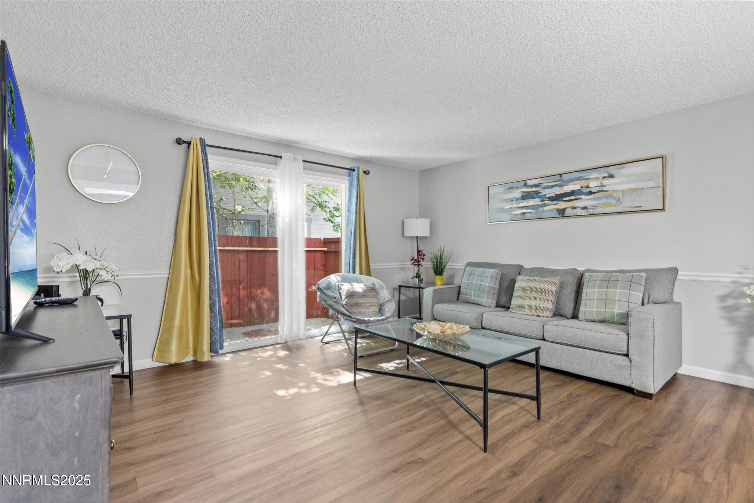 400 Claremont Street Reno, NV 89502 - Photo 31 of 32 a living room with furniture and a large window