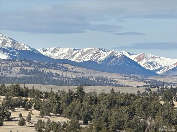 a view of mountain view with mountains in the background