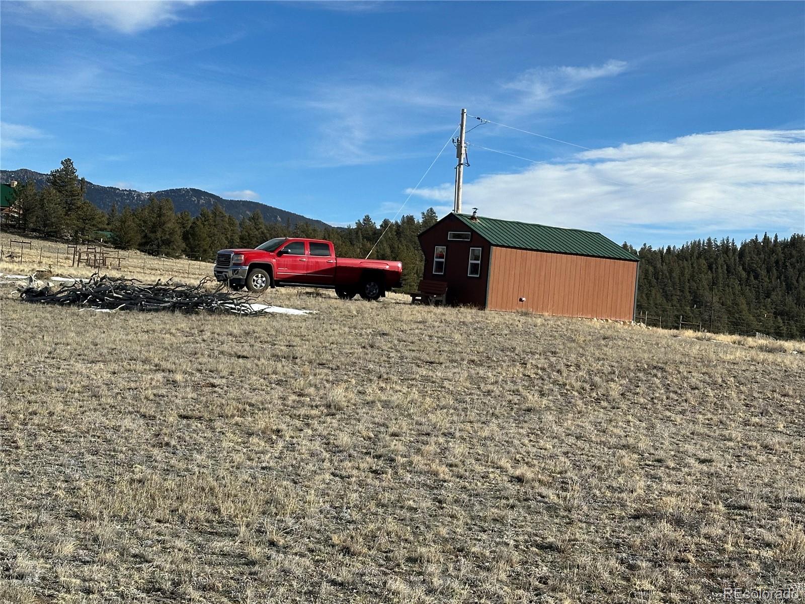 1289 Willow Way Jefferson, CO 80456 - Photo 20 of 49 a view of a terrace with a bench