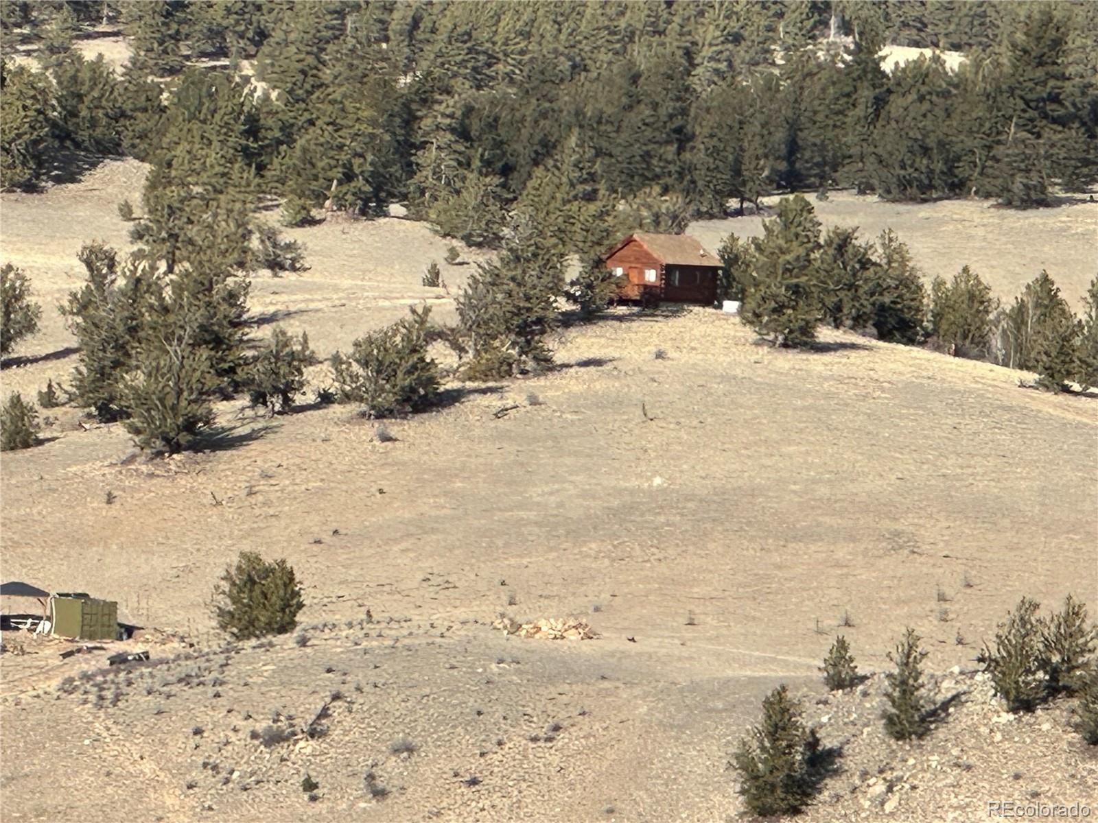 1289 Willow Way Jefferson, CO 80456 - Photo 34 of 49 a view of a yard covered in snow