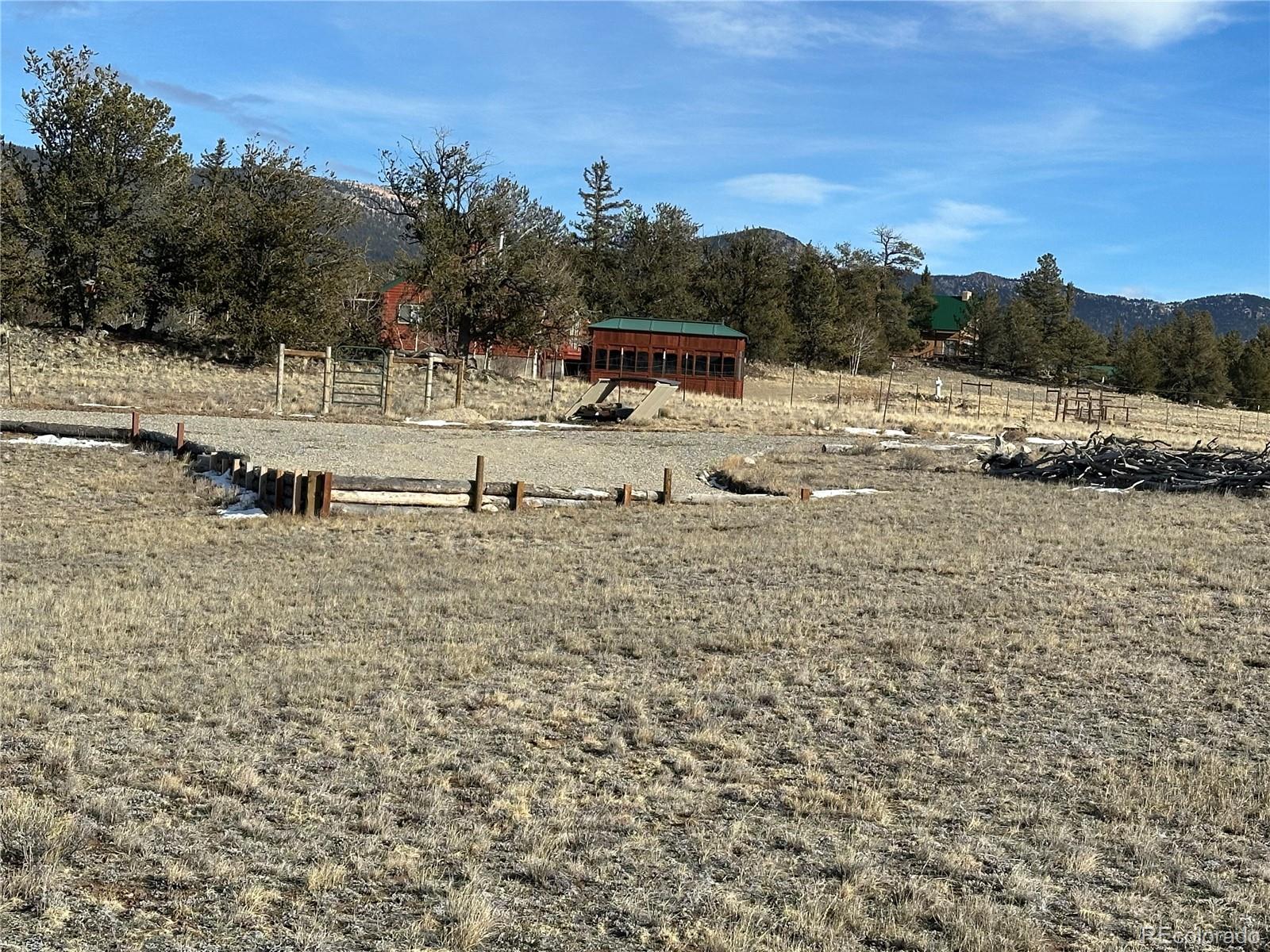 1289 Willow Way Jefferson, CO 80456 - Photo 39 of 49 a view of a yard with wooden fence