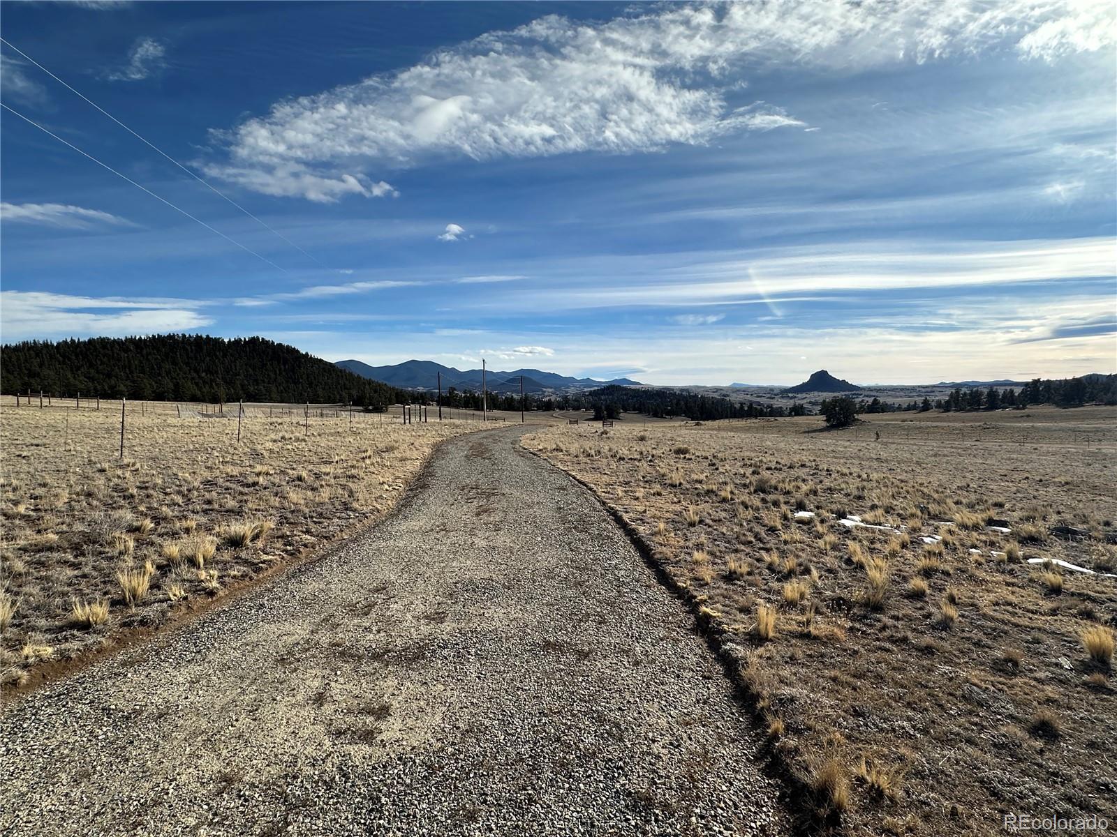 1289 Willow Way Jefferson, CO 80456 - Photo 42 of 49 a view of ocean with sunset