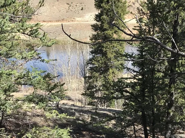 a view of lake and mountain