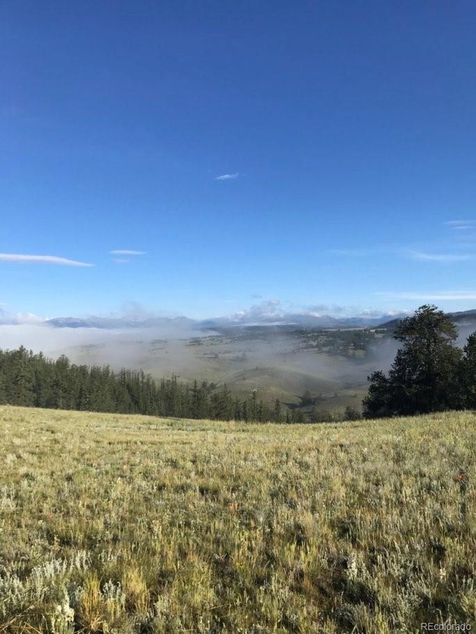 1289 Willow Way Jefferson, CO 80456 - Photo 8 of 49 a view of lake with mountain in background