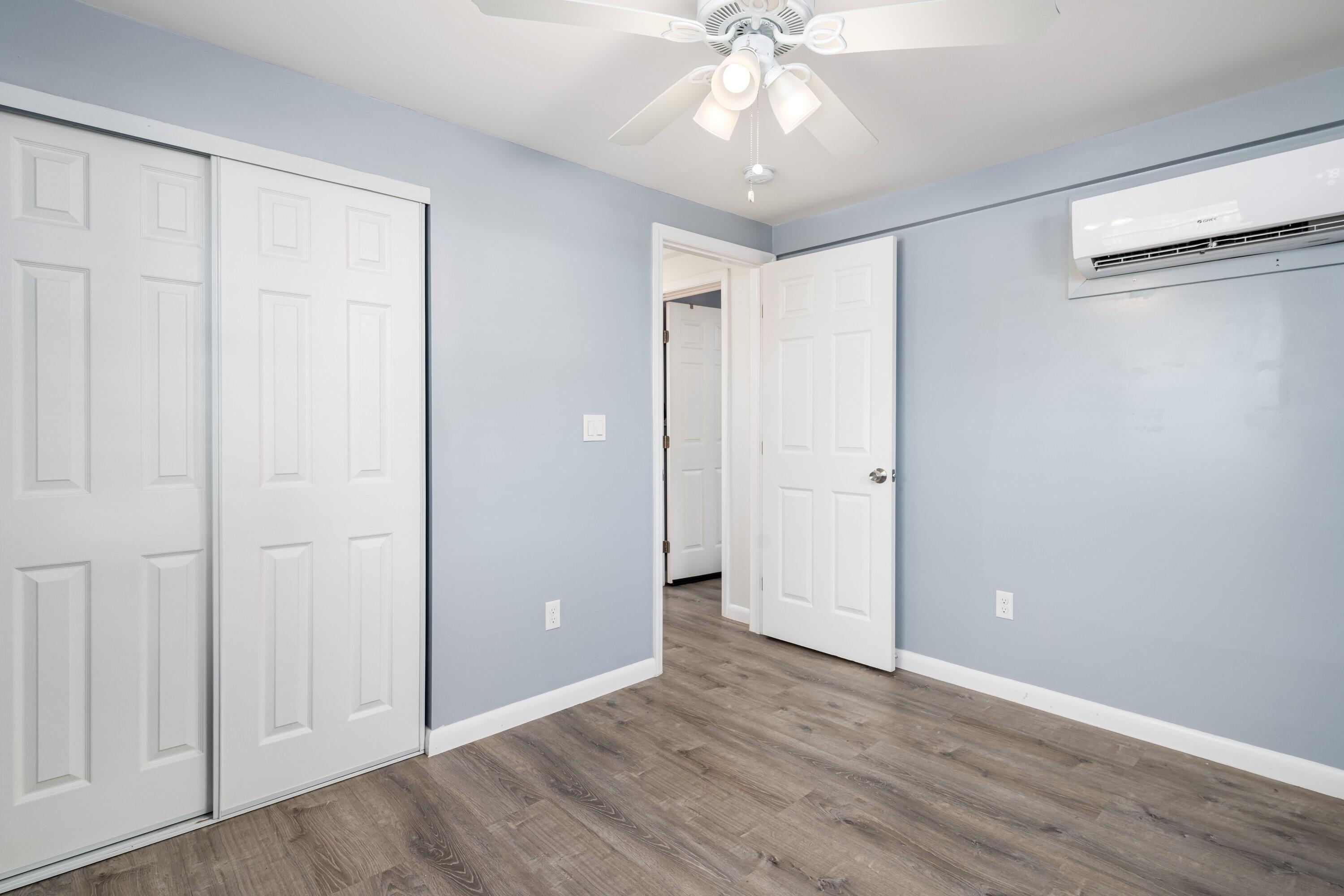 30023 Pine Channel Road Big Pine Key, FL 33043 - Photo 14 of 31 a view of an empty room with wooden floor
