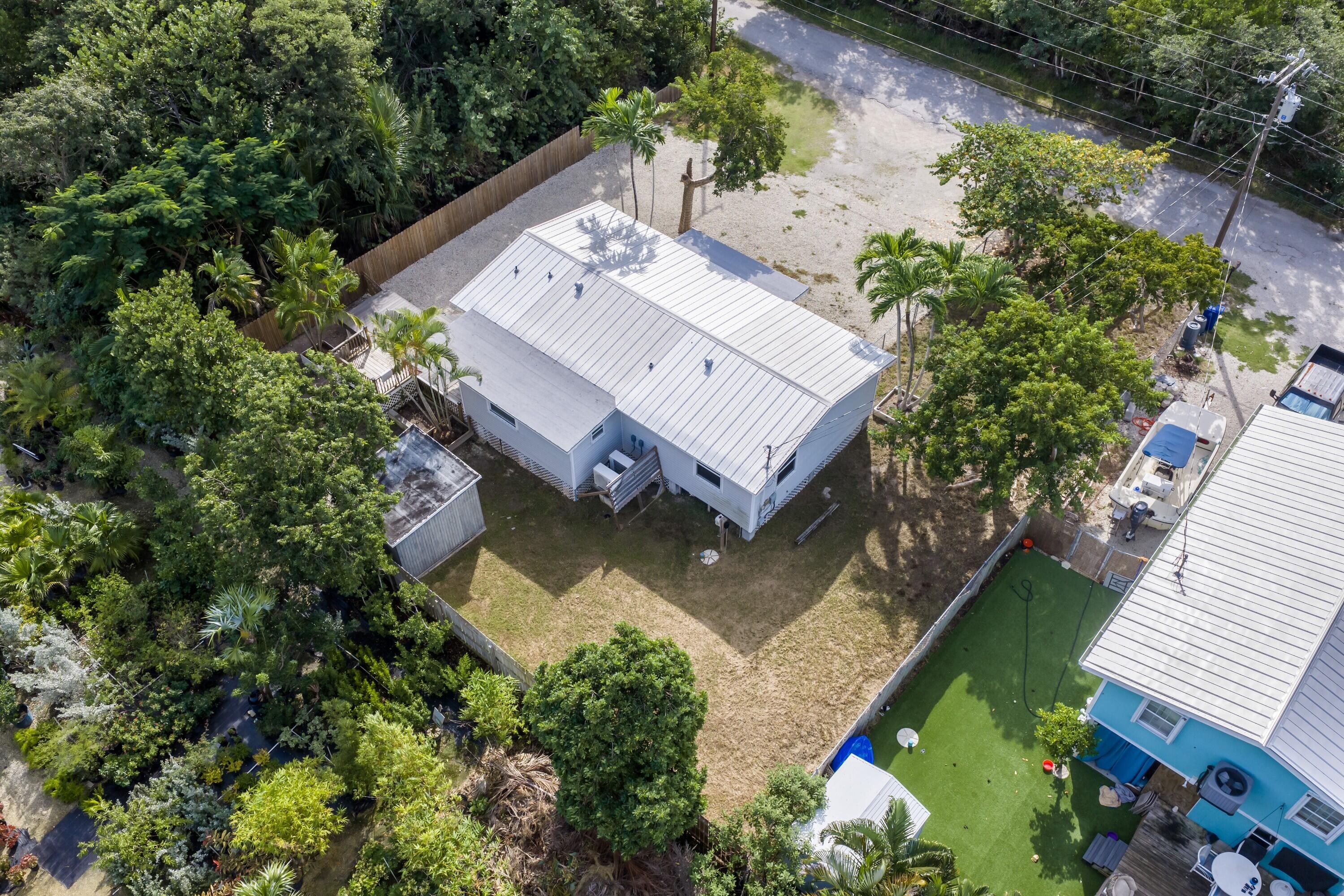 30023 Pine Channel Road Big Pine Key, FL 33043 - Photo 26 of 31 an aerial view of a house with a garden