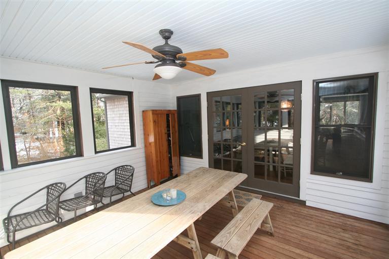 272 Pine Ridge Road Cotuit, MA 02635 - Photo 11 of 19 a view of a kitchen from a dining room