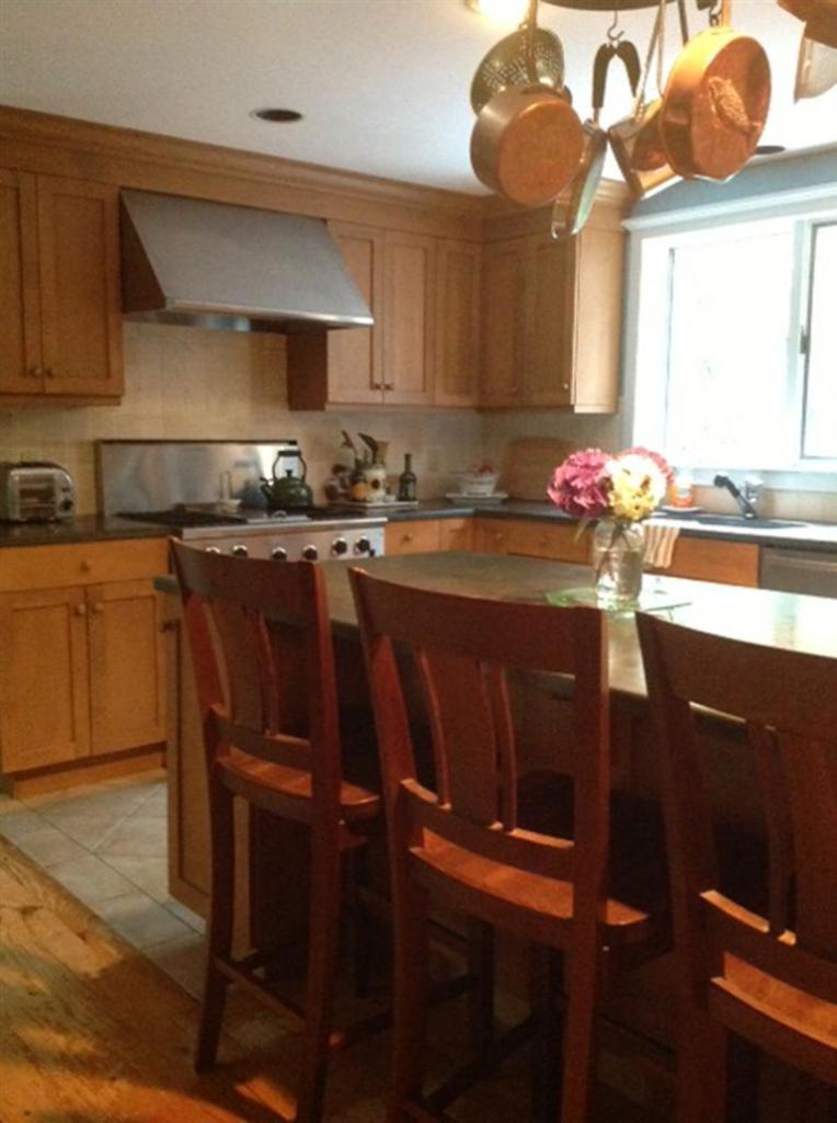 272 Pine Ridge Road Cotuit, MA 02635 - Photo 9 of 19 a kitchen with a sink cabinets and window