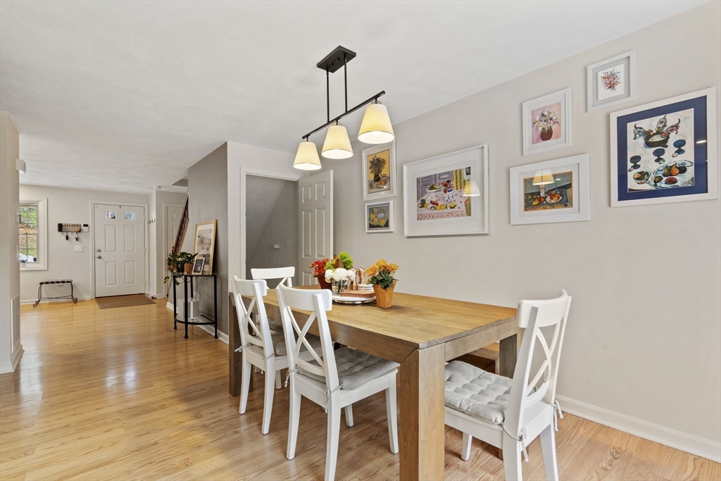 4 Apple Ridge Road, Unit 6 Maynard, MA 01754 - Photo 10 of 40 a dining room with furniture and window