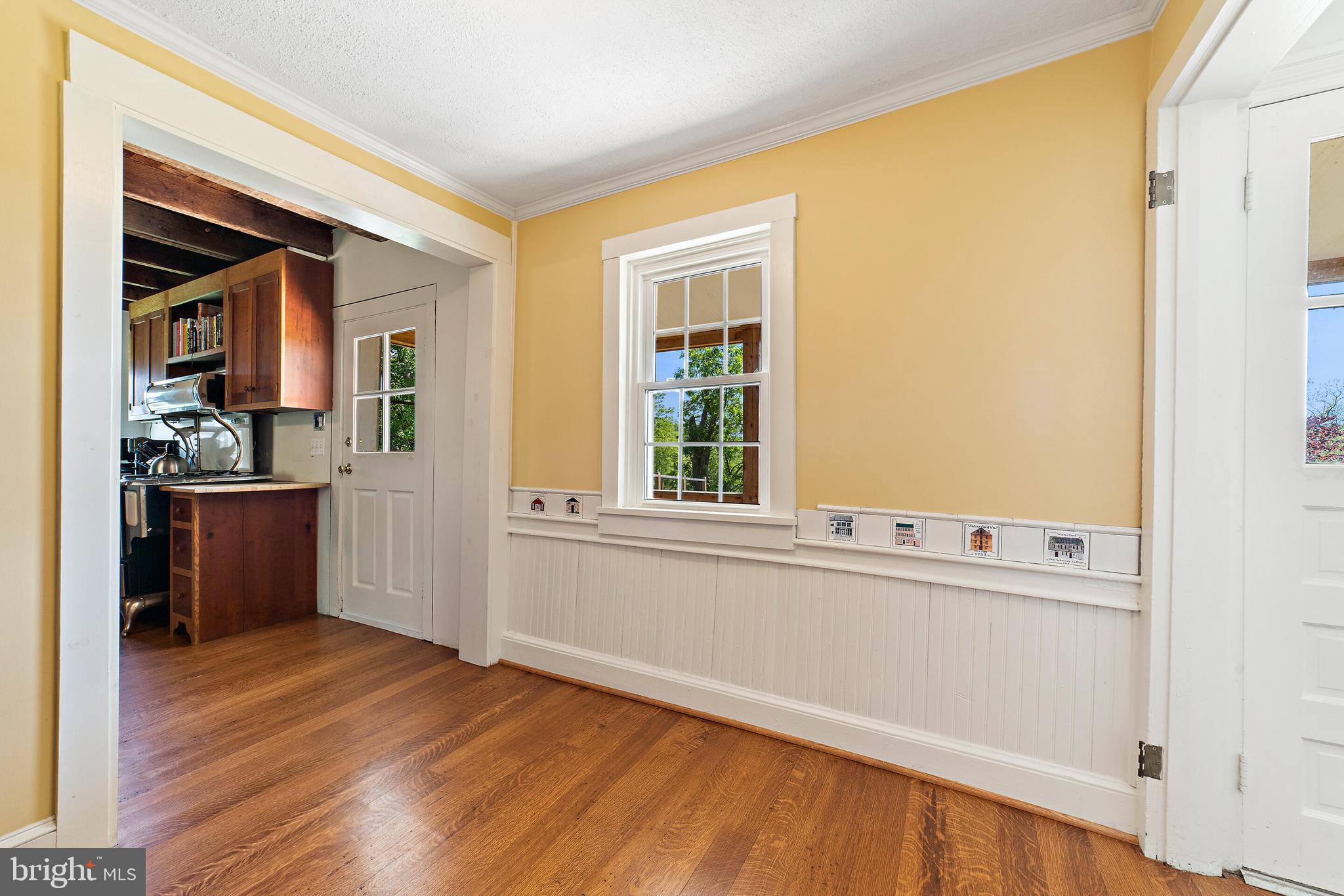 16358 Hamilton Station Road Waterford, VA 20197 - Photo 14 of 42 Foyer with the main door and the kitchen door