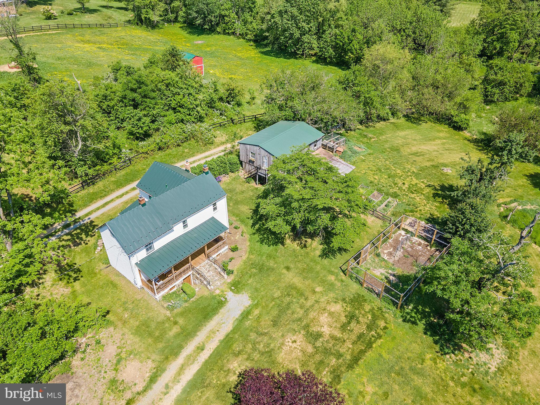 16358 Hamilton Station Road Waterford, VA 20197 - Photo 4 of 42 Barn, chicken coop & fenced garden near the house