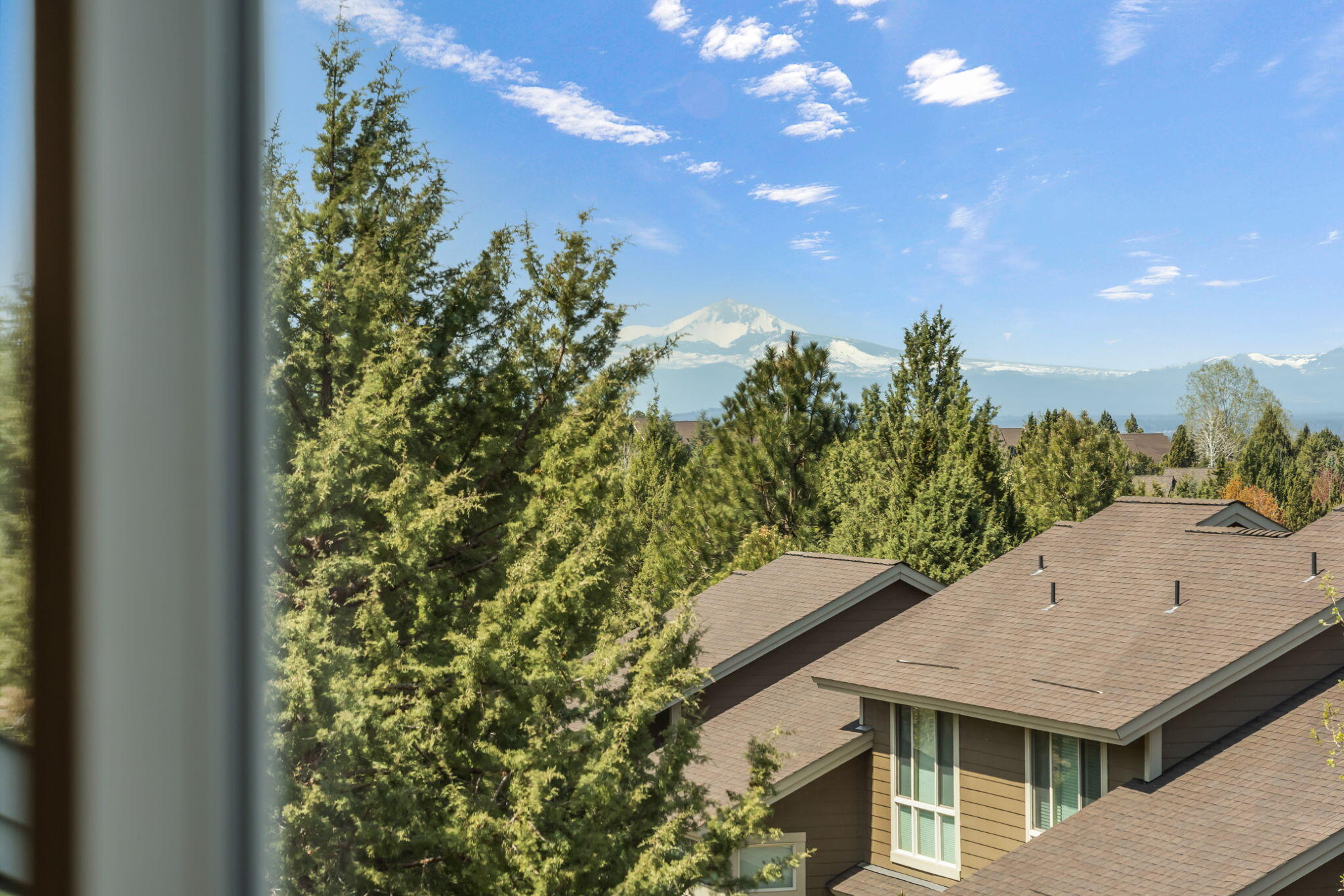 10870 Village Loop Redmond, OR 97756 - Photo 19 of 35 a view of a house with a yard and sitting area