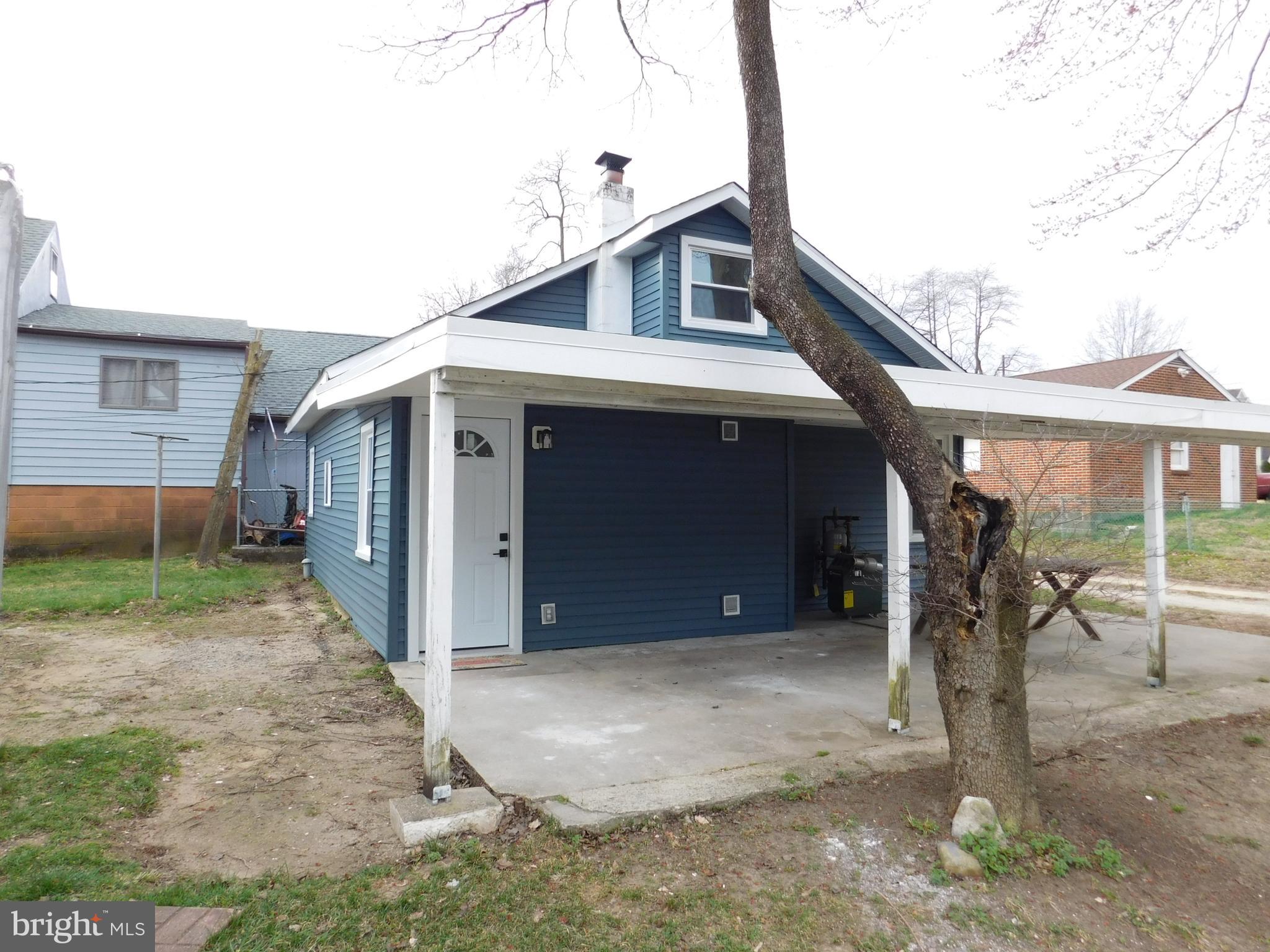 511 Cherry Street, Unit 4 Roebling, NJ 08554 - Photo 2 of 14 a front view of a house with a yard