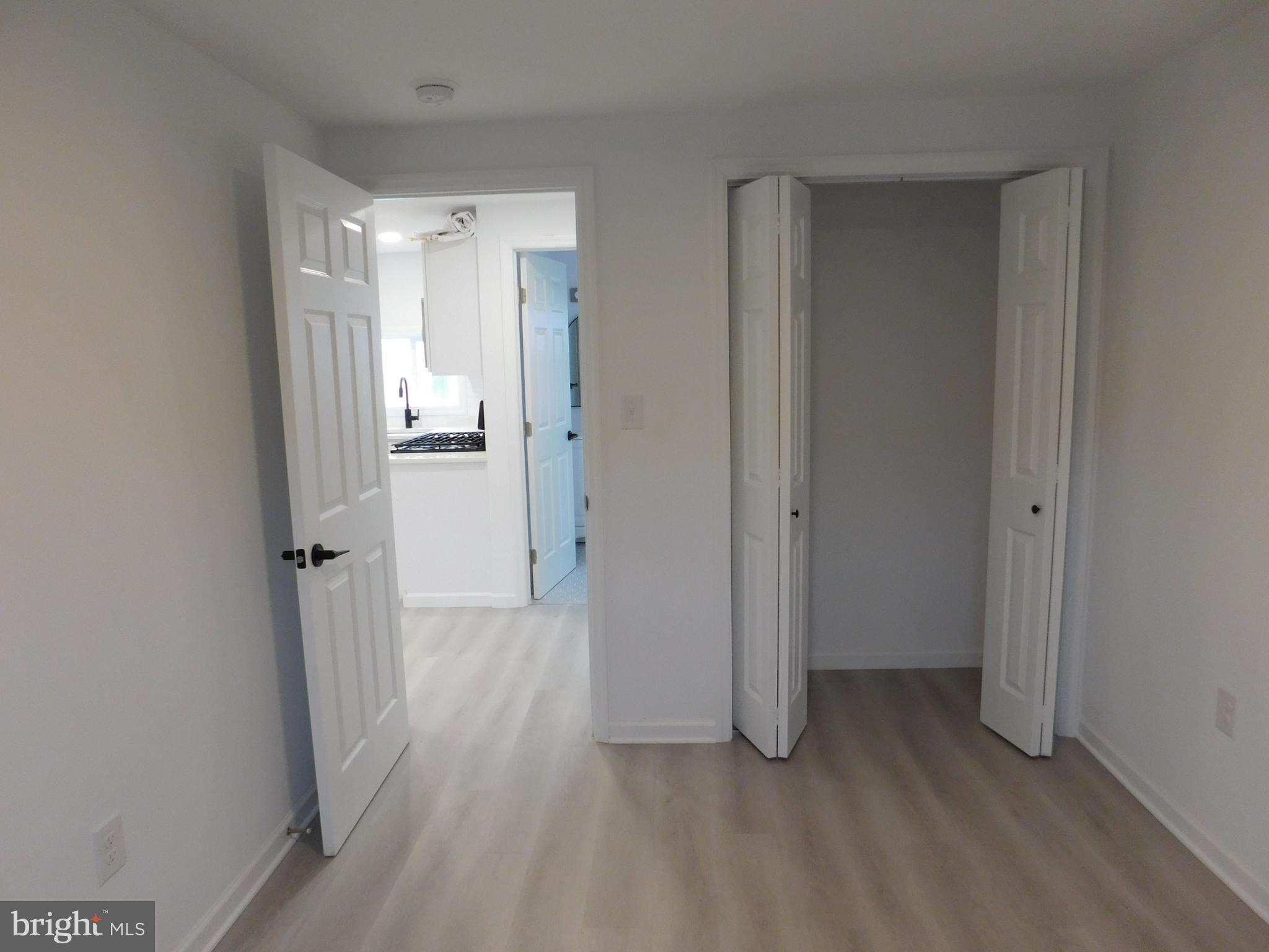511 Cherry Street, Unit 4 Roebling, NJ 08554 - Photo 9 of 14 a view of a hallway with wooden floor