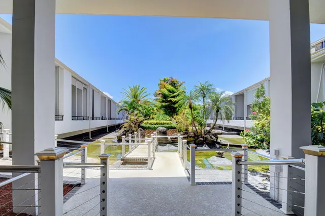 a view of a building with a yard