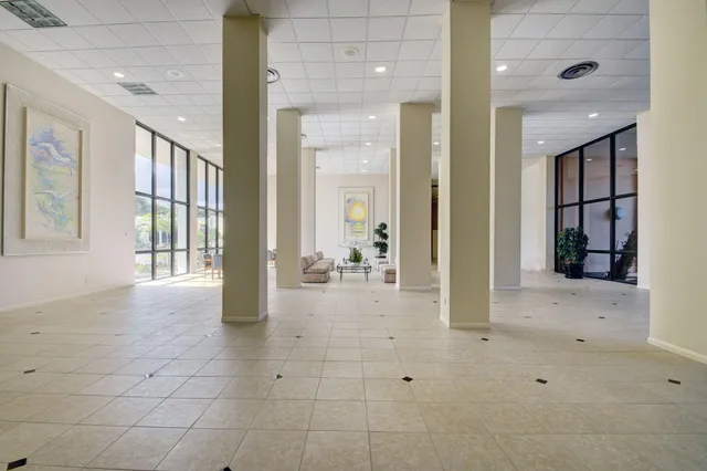 a view of a backyard with sitting area