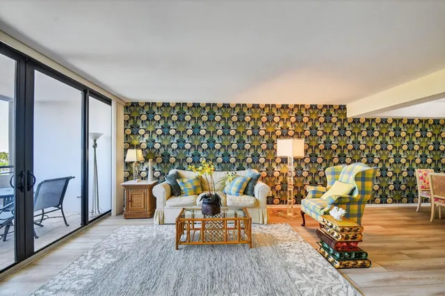 a view of a chairs and table on the deck