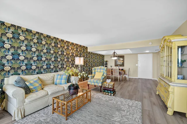 a living room with furniture and a rug