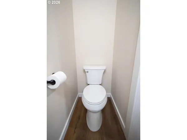 a bathroom with a toilet and a sink
