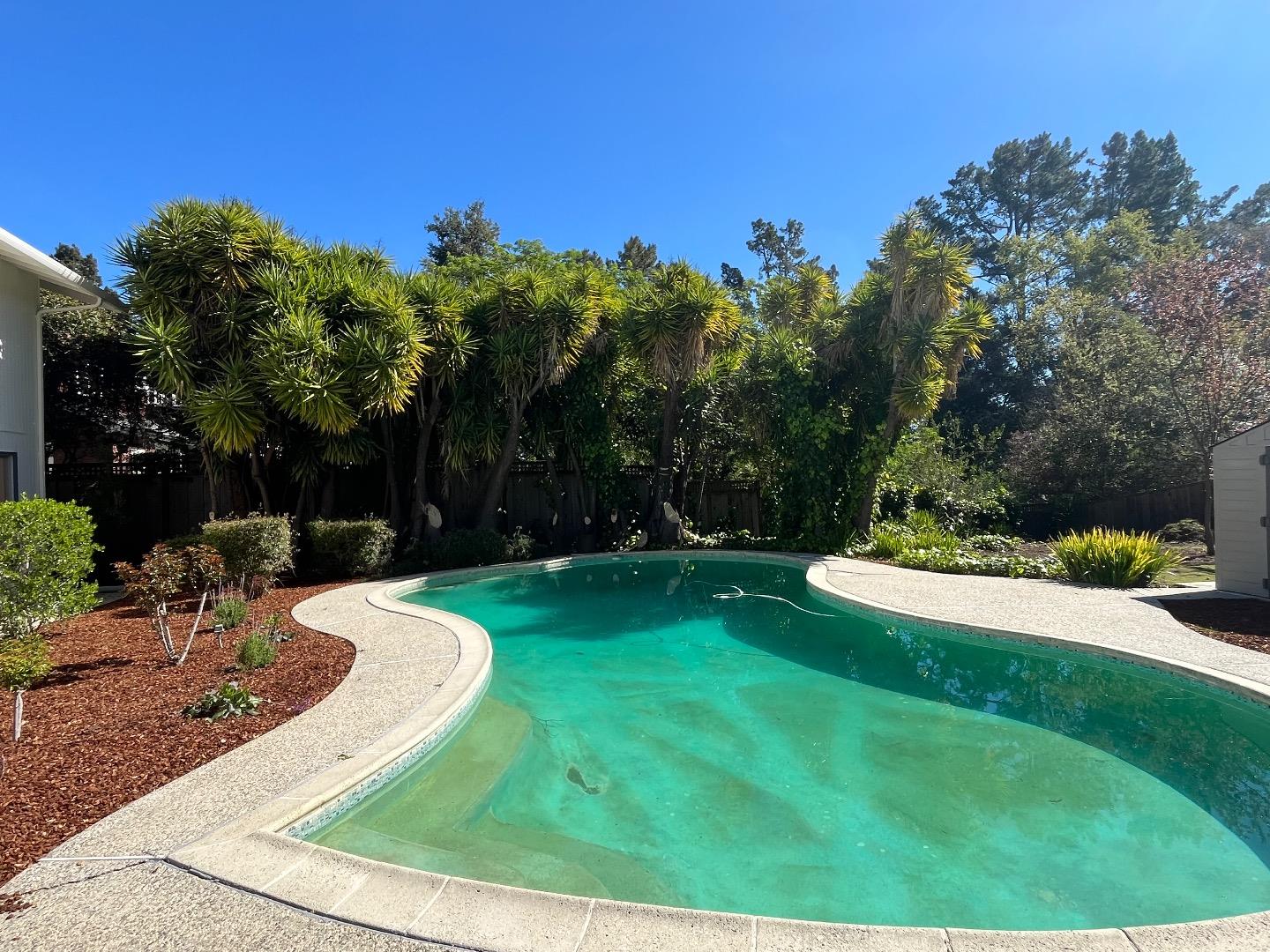 2245 Tioga Drive Menlo Park, CA 94025 - Photo 2 of 2 a view of a backyard with swimming pool
