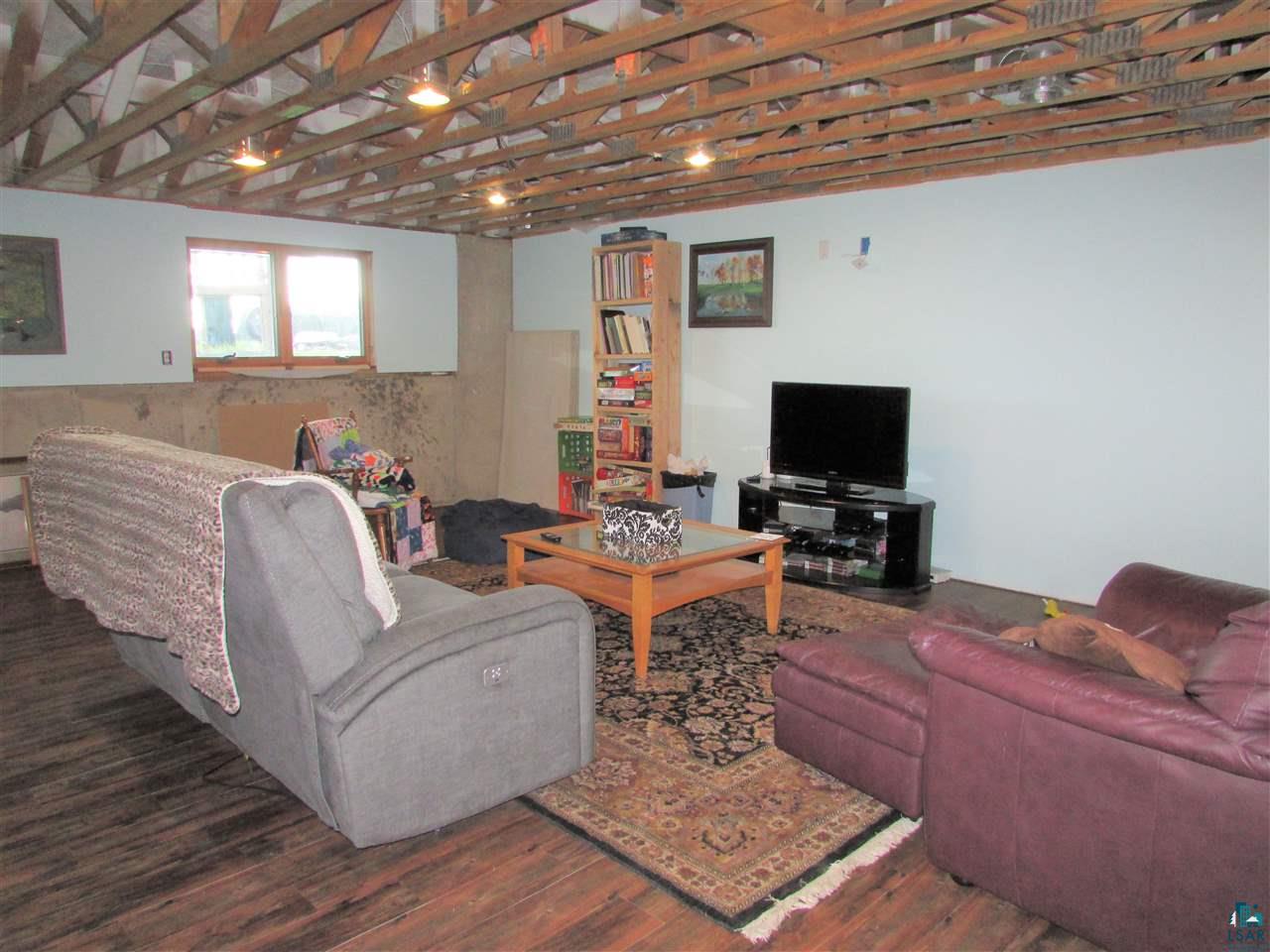 3491 Sandy Lake Road Barnum, MN 55707 - Photo 19 of 36 Family room
