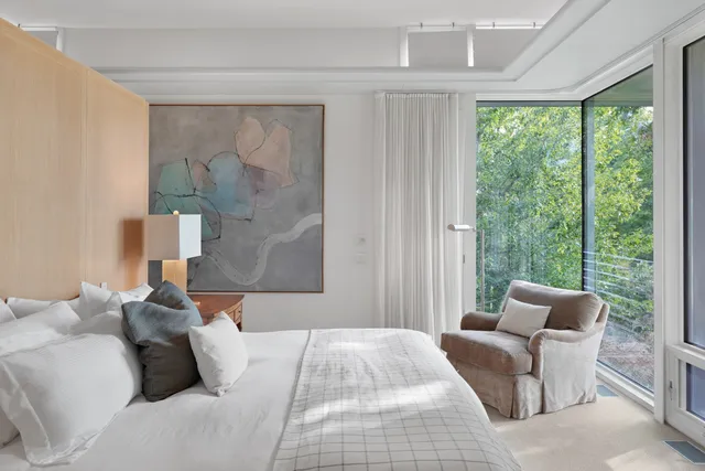 a balcony with view of garden