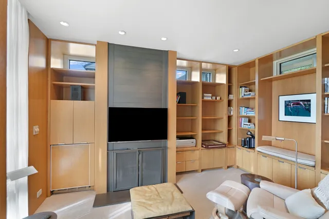a bathroom with a glass door shower
