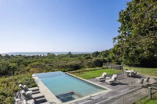 a view of a chairs and table on the terrace