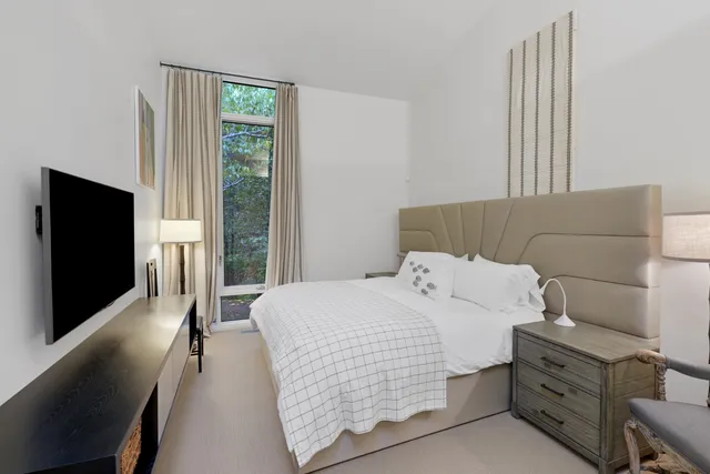 a bathroom with a granite countertop sink mirror and a