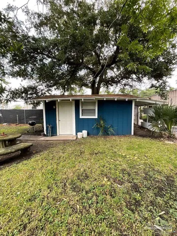 a house view with a garden space
