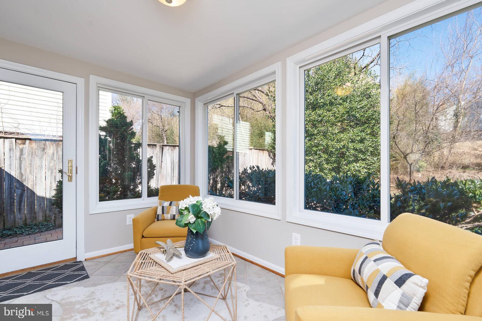 10313 Inwood Avenue Silver Spring, MD 20902 - Photo 11 of 33 Door leads to patio in the sun room