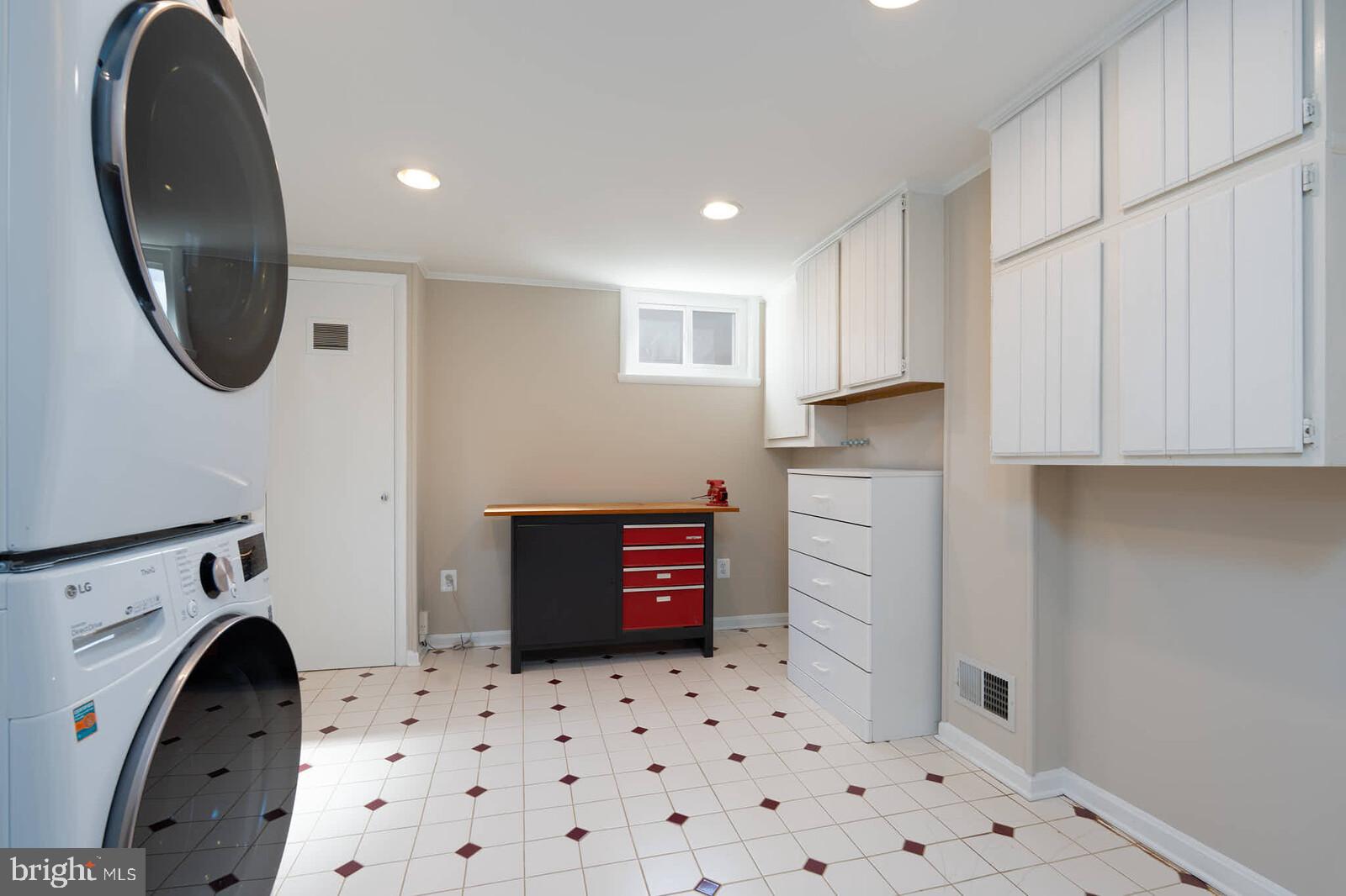 10313 Inwood Avenue Silver Spring, MD 20902 - Photo 23 of 33 Extra cabinetry in laundry room