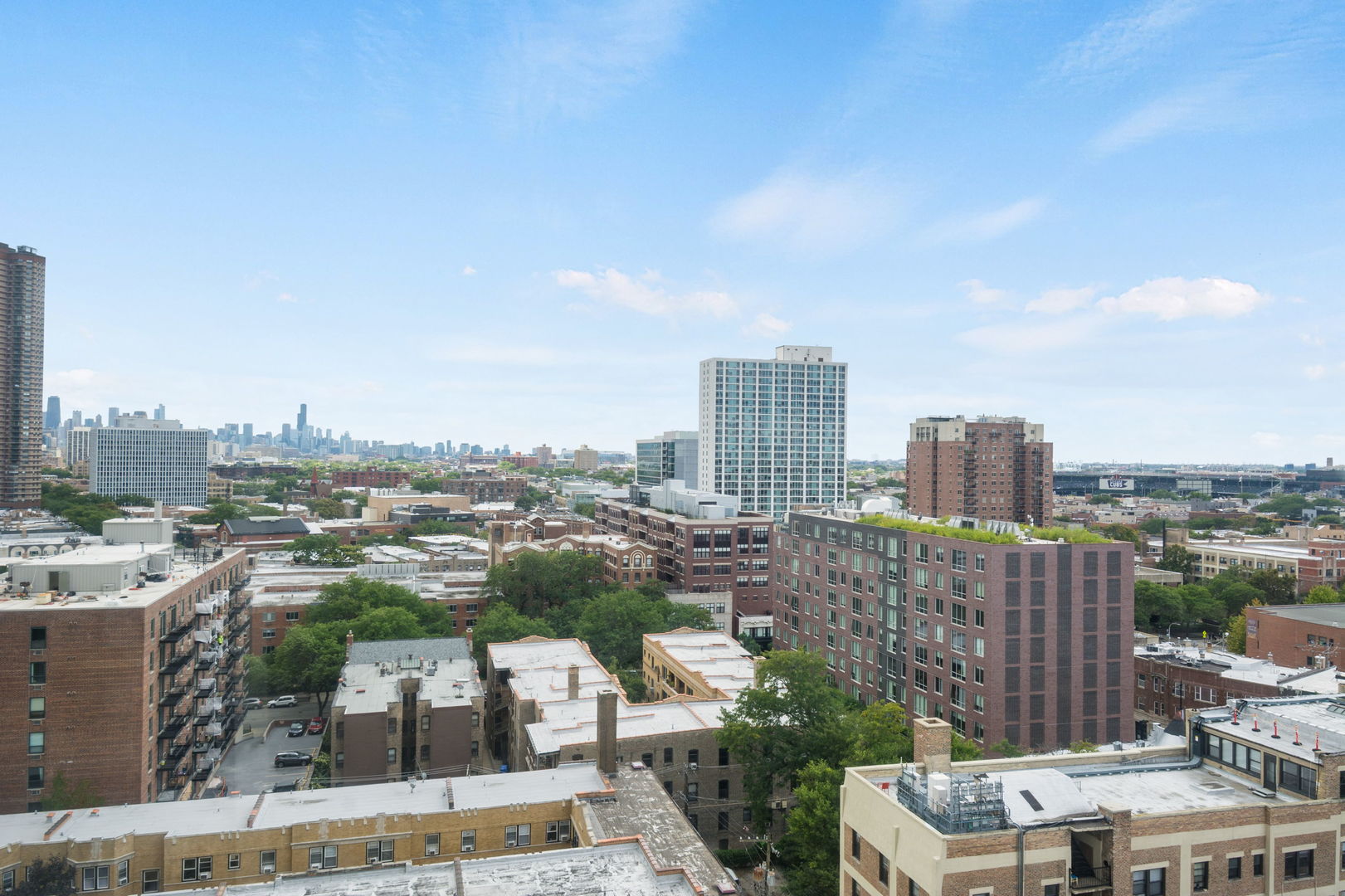 3930 North Pine Grove Avenue, Unit 1606 Chicago, IL 60613 - Photo 8 of 17 a city view with buildings