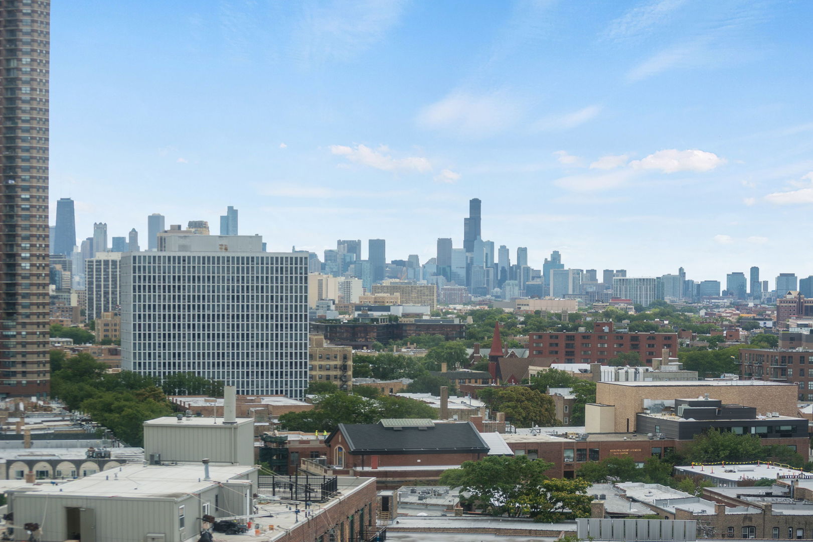 3930 North Pine Grove Avenue, Unit 1606 Chicago, IL 60613 - Photo 9 of 17 a view of a city with tall buildings