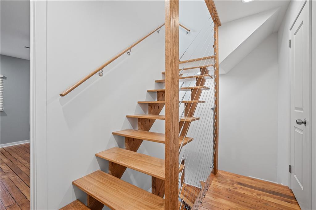 4808 Lima Way Pittsburgh, PA 15224 - Photo 12 of 26 a view of entryway with wooden floor and stairs