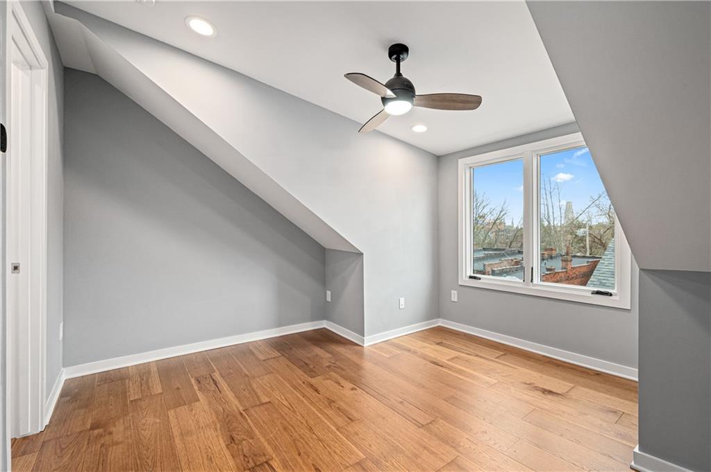4808 Lima Way Pittsburgh, PA 15224 - Photo 23 of 26 a view of empty room with wooden floor and fan