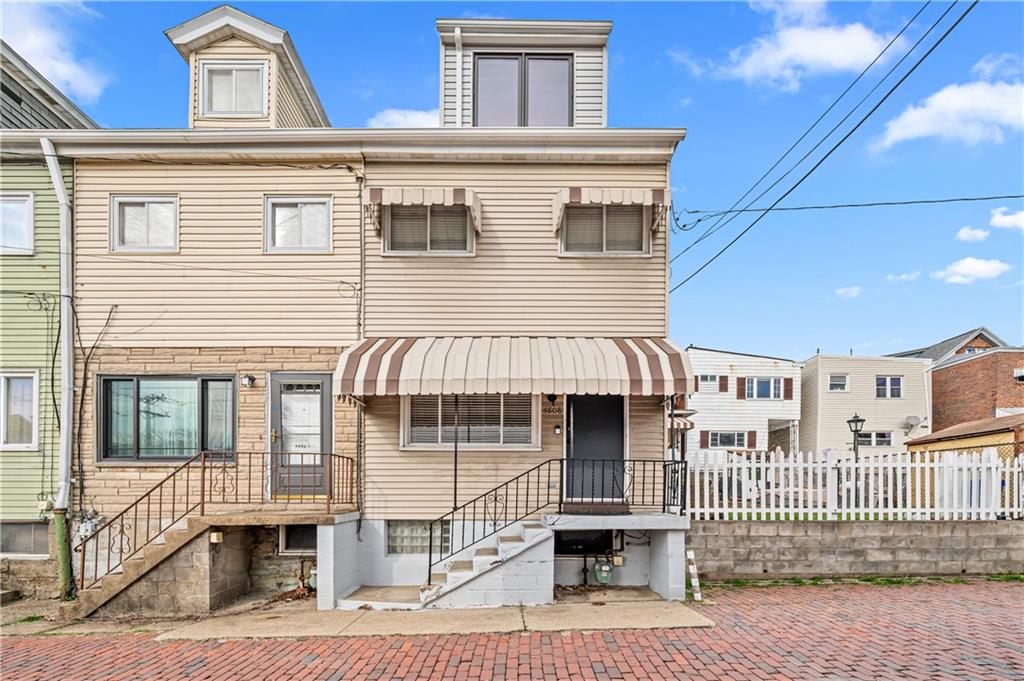 4808 Lima Way Pittsburgh, PA 15224 - Photo 25 of 26 a front view of a house with a balcony