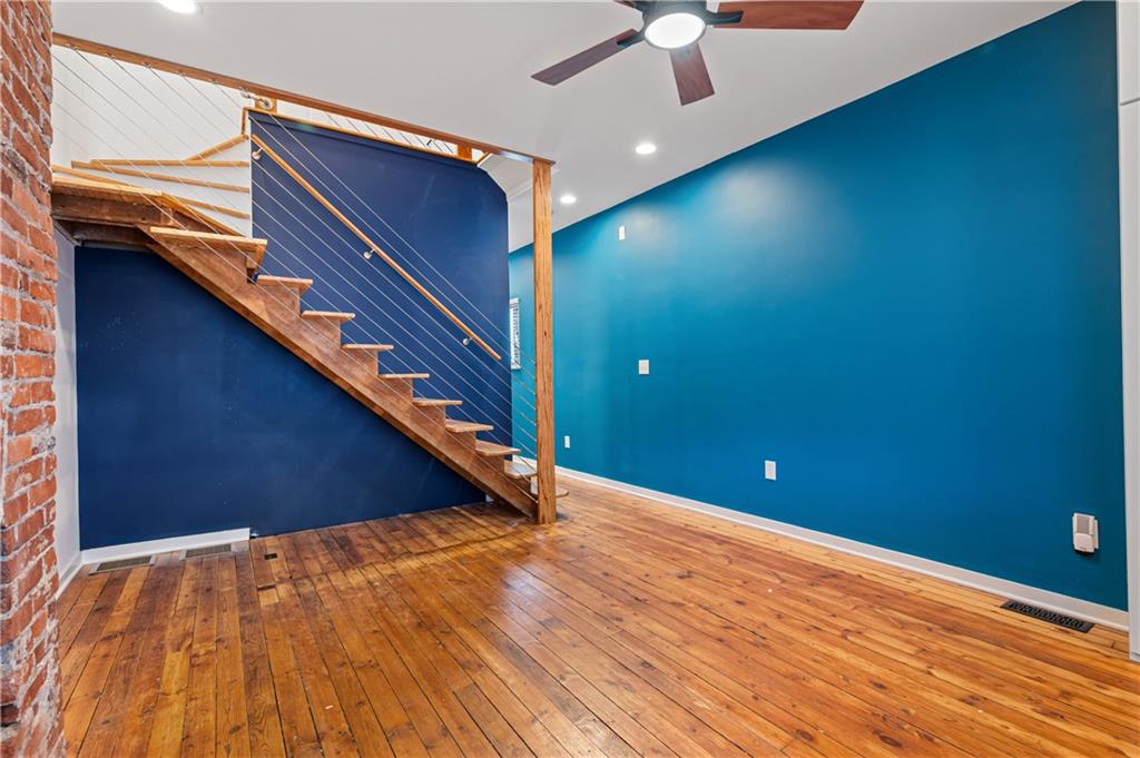 4808 Lima Way Pittsburgh, PA 15224 - Photo 10 of 26 a view of an empty room with wooden floor