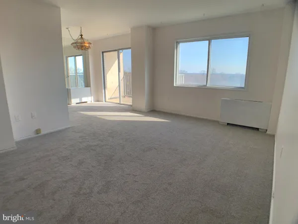 an empty room that has a window