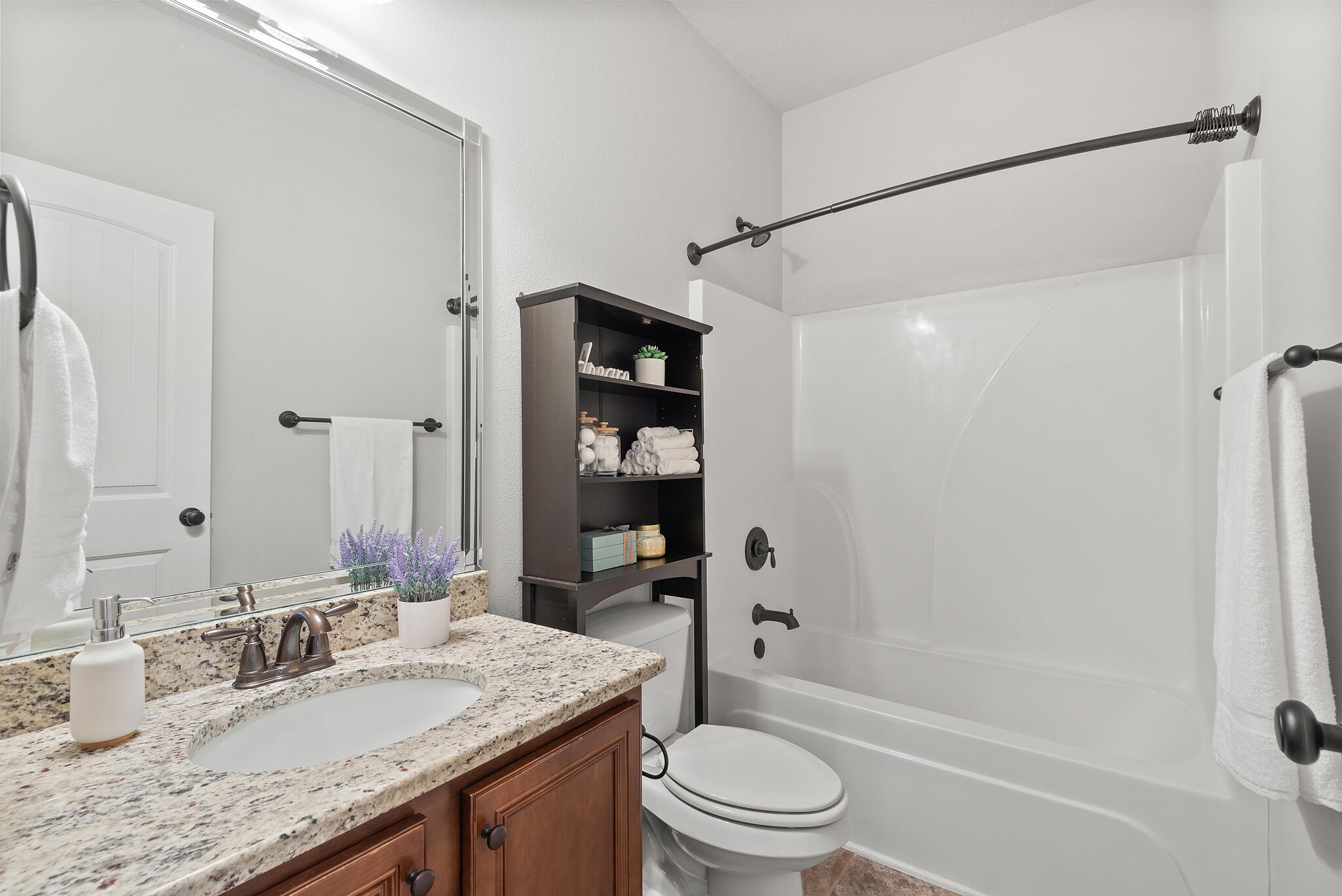 399 Old Ferry Road Santa Rosa Beach, FL 32459 - Photo 33 of 51 a bathroom with a granite countertop sink toilet and shower