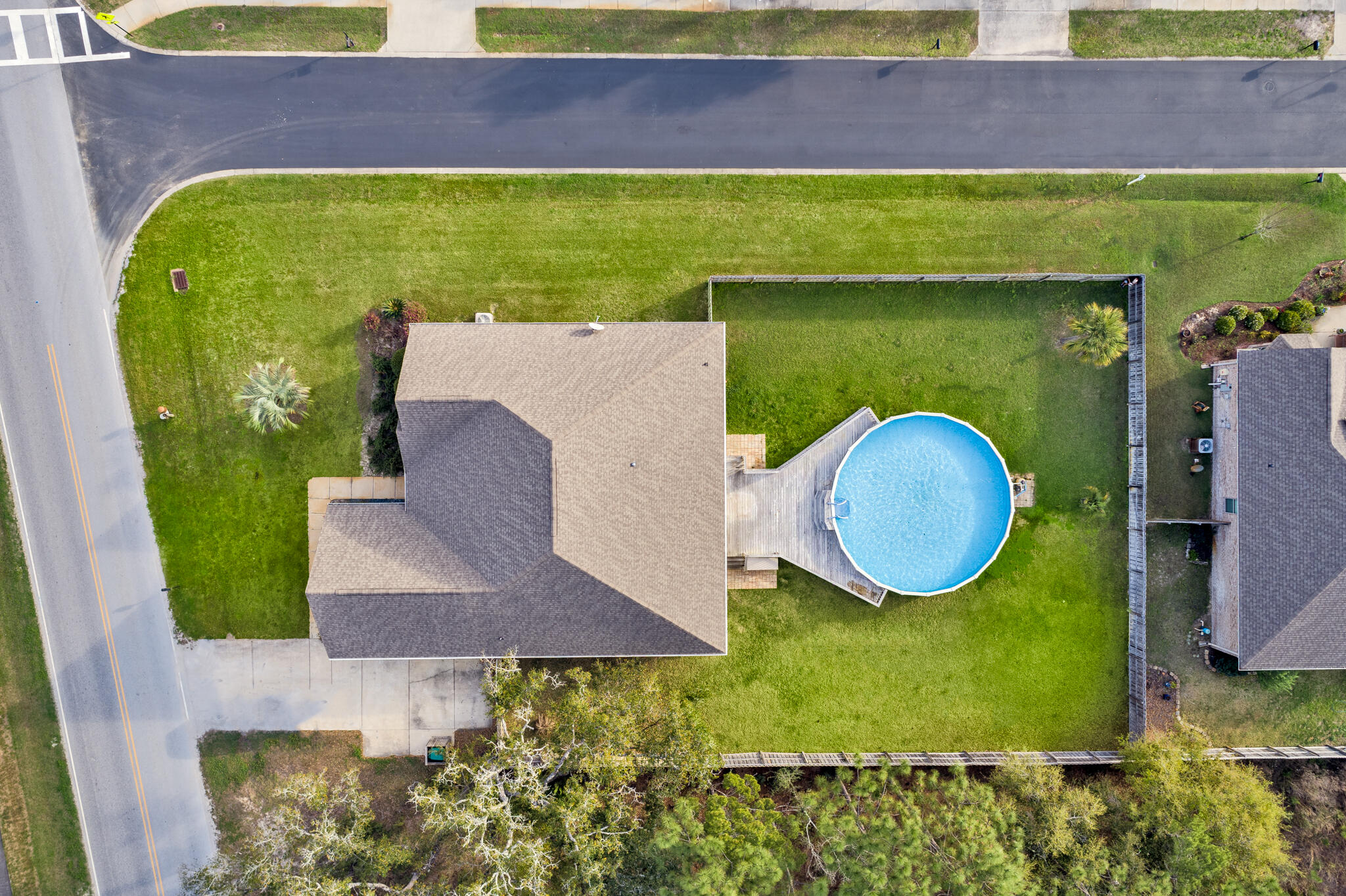 399 Old Ferry Road Santa Rosa Beach, FL 32459 - Photo 49 of 51 a aerial view of a house with a swimming pool and a yard