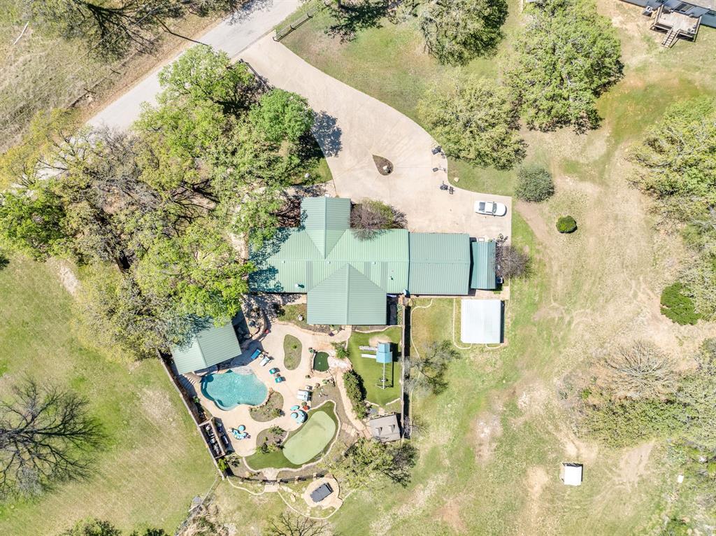 660 Deer Trail Gordon, TX 76453 - Photo 3 of 40 an aerial view of a house with swimming pool